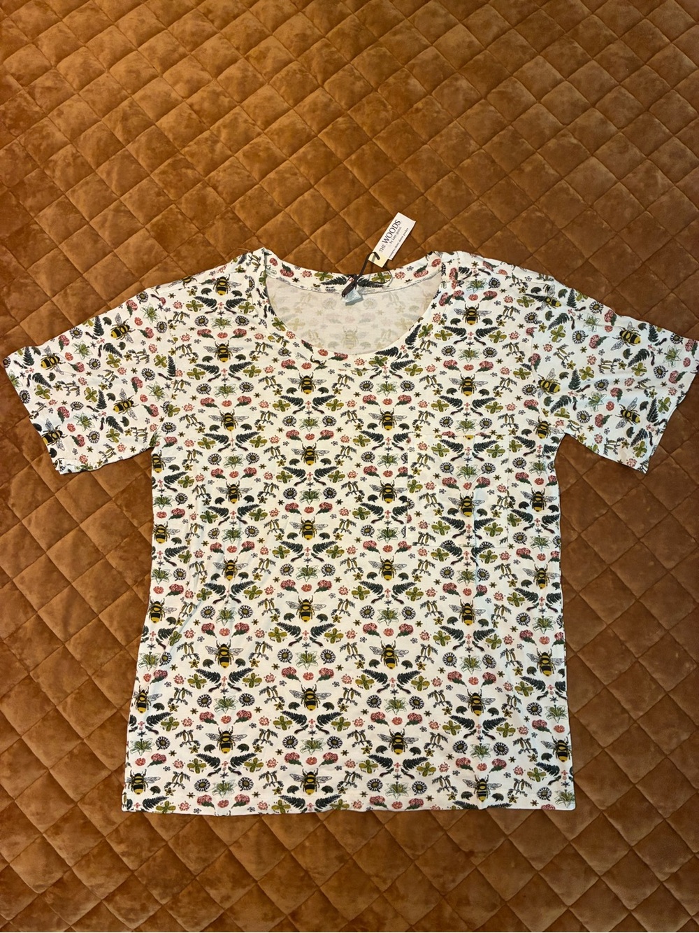 Kate Quinn floral bee top